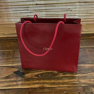 Cartier shopping bag. Classic red bag with gold Cartier
